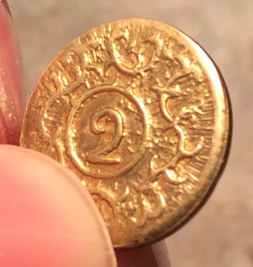 Small-Gold-Colored-Coin-With-A-2-On-It?-No-Clue-What-It-Is.